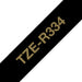 EAN 4977766802345 - Brother TZE-R334 cinta para impresora de etiquetas Oro sobre negro imagen 1