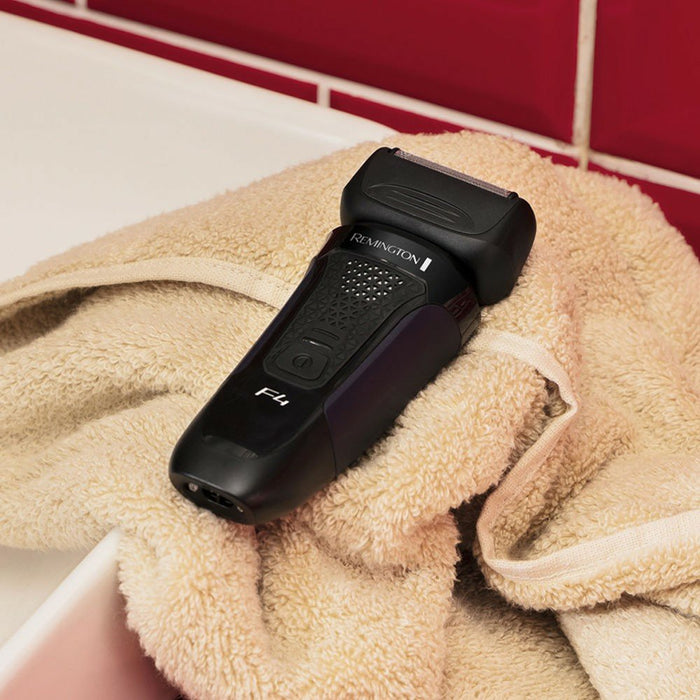 EAN 5038061152067 - Remington F4002 afeitadora Máquina de afeitar de rotación Recortadora Negro, Azul imagen 7